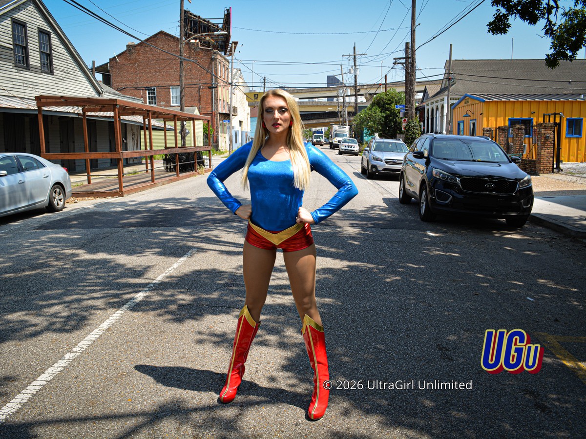 Charisma Davis as UltraGirl, standing in the middle of a city street